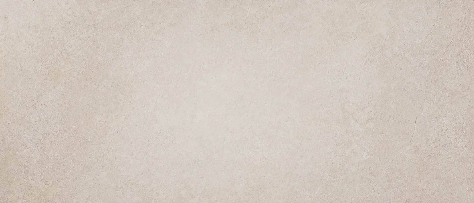 Texture de pierre claire en pleine largeur.